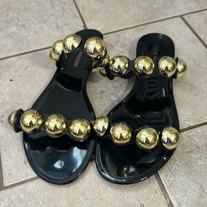 Gold studded jelly sandals
